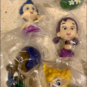 Bubble Guppies cake topper characters and candle